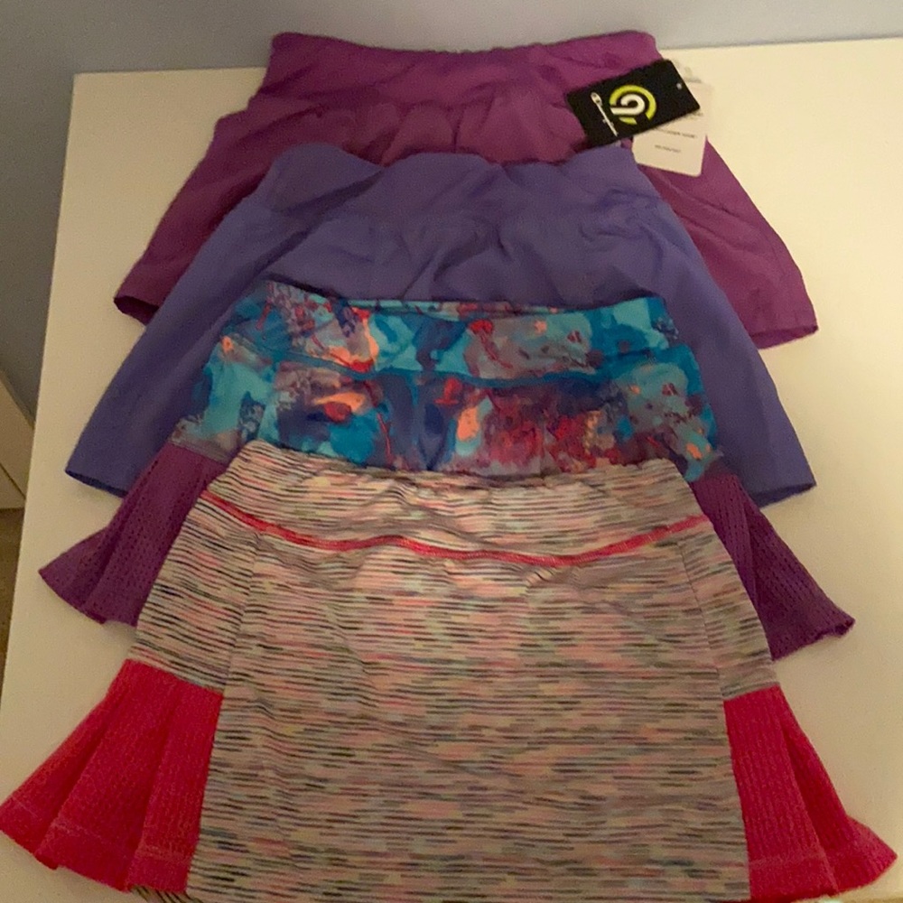 4 Skorts, 7/8 Champion, never worn